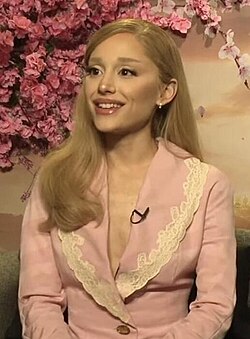 Ariana Grande in 2024, wearing pink suit while promoting the film Wicked