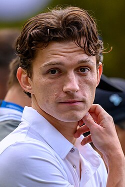 A picture of Tom Holland looking towards the camera